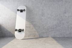 白色滑板在混凝土墙壁背景
