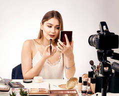 girl blogger shoots video how to do makeup