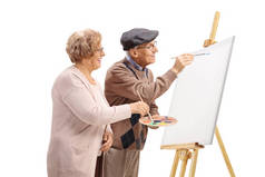 老年男女在画布上画画笔