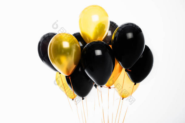 喜庆的<strong>黑色</strong>和<strong>金色气球</strong>隔离在白色上