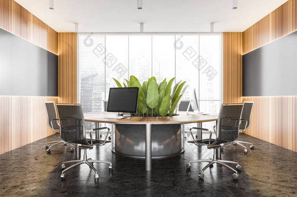 内部的时尚的开放空间办公室与灰色和木制墙壁，混凝土地面和<strong>圆形</strong>计算机<strong>桌子</strong>。3d渲染