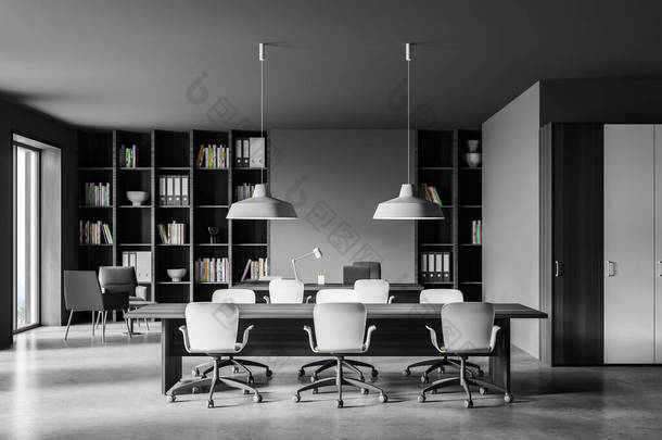 现代化会议室的内部有灰色<strong>墙</strong>壁、混凝土地板、长桌和<strong>书柜</strong>。3d渲染