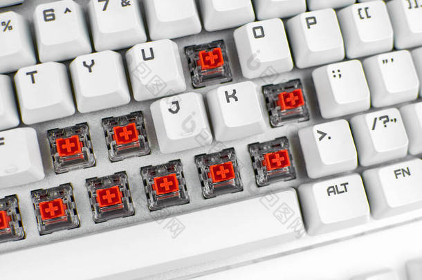 机械键盘<strong>开关</strong>红色<strong>开关</strong>的游戏机械键盘,有选择的焦点.维修电脑设备