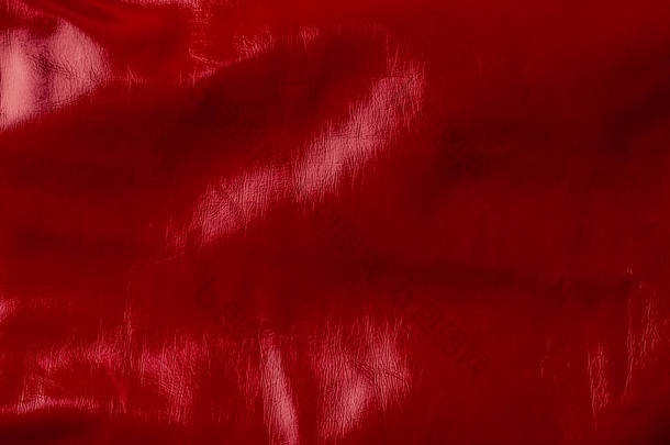 <strong>红色光</strong>泽的纺织品的上部看法作为背景