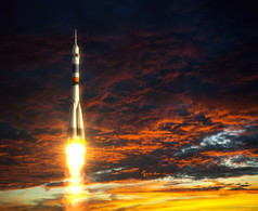 运载火箭，背景为红云