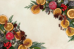 圣诞香料水果和花卉边框