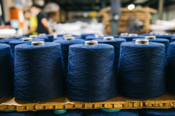 Cotton yarns or threads on spool tube bobbins at cotton yarn factory