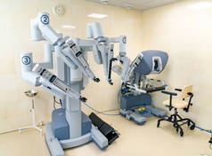 Modern robotic surgery equipment. Scientific surgical robot da vinci.