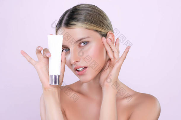 Alluring beautiful perfect cosmetic skin woman portrait hold <strong>mockup</strong> tube cream or moisturizer for sk