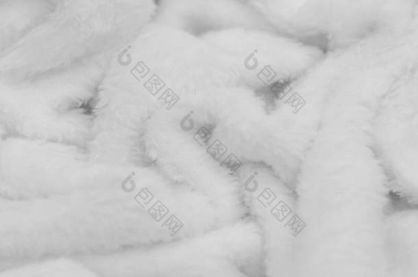 天鹅绒刷洗。白色的。（来自法国毛绒）- -短绒或绒毛织物，与绒毛或天鹅绒相同。白色动物毛皮纹理背景，毛绒绒纹理特写
