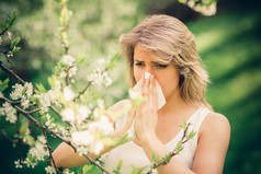 Woman with pollen allergy in springtime