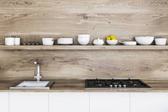 木制厨房台面与水槽和炊具。一个长架子, 上面挂着一堵木墙上的盘子。3d 渲染