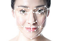 face detection or facial recognition grid overlay on face of woman