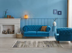 蓝色沙发和墙体概念，内饰橙色灯，框架中桌风格.