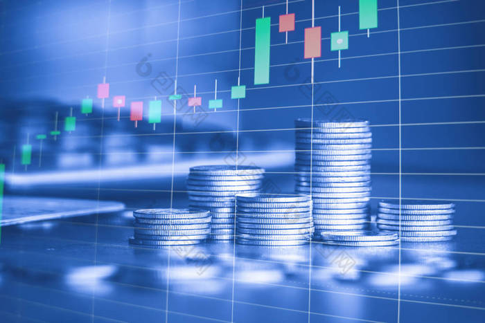 成堆的金币与交易图表的背景金融投资概念图片-包图网企业站