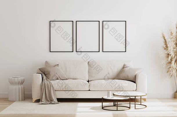 在北欧风格的客厅内部，现代客厅内部背景，米黄色沙发和潘帕斯草，3D渲染的空白招贴画框架