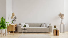 空荡荡的客厅，沙发上有植物和桌子，放在空荡荡的白墙背景上。