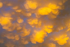 Cumulus and Stratus clouds in dramatic sunset sky over Cape Town South Africa