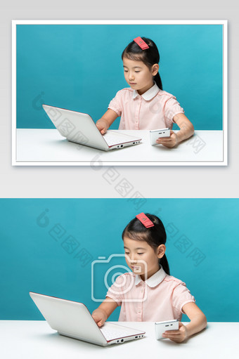 穿粉色衣服玩电脑的小女孩图片