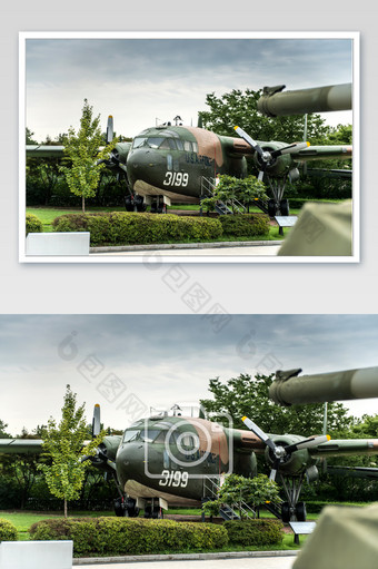 停在草坪上的绿色飞机直升机图片