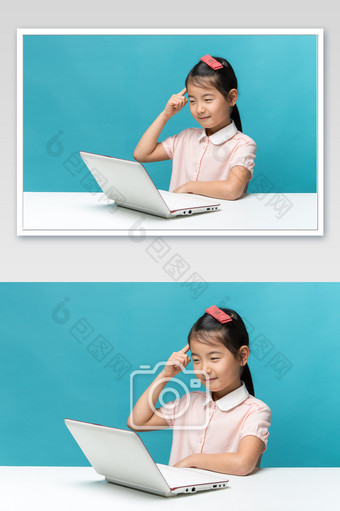 坐在电脑前思考的小女孩图片