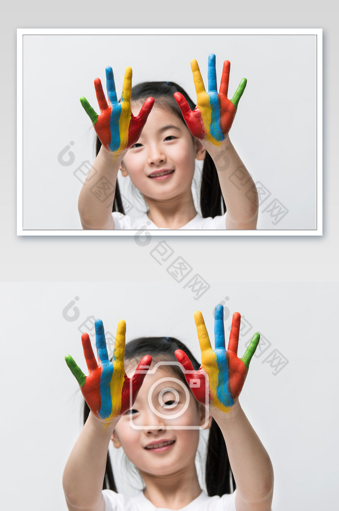 双马尾女孩双手沾满彩色涂料露脸特写图片图片