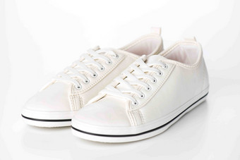 时尚白色板鞋跑鞋静物摄影图