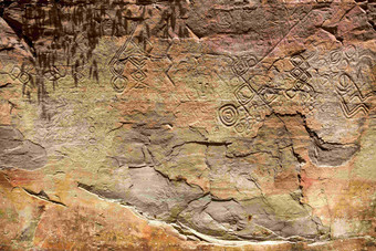 新石器时期文化遗产岩石雕刻摄影图