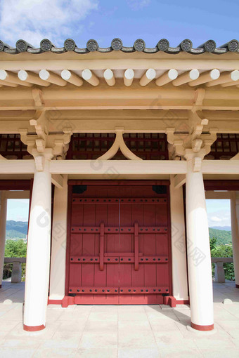 韩国特色红色大门古典遗址摄影图