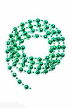 绿色成串小珠子静物摄影图