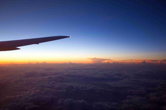 落日云翼飞机行业云海景观摄影图