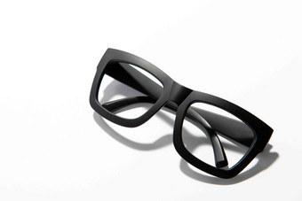 黑色眼镜框眼镜时尚静物摄影图