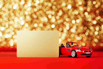 黄金卡<strong>交通金融</strong>红色汽车模型场景摄影图