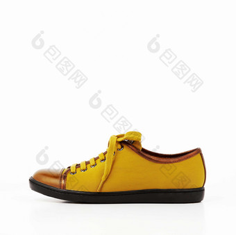 黄色拼色时尚皮革男式皮鞋单品摄影图