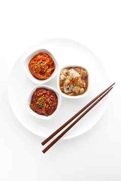韩国小菜肥肠小菜大酱特色食物摄影图