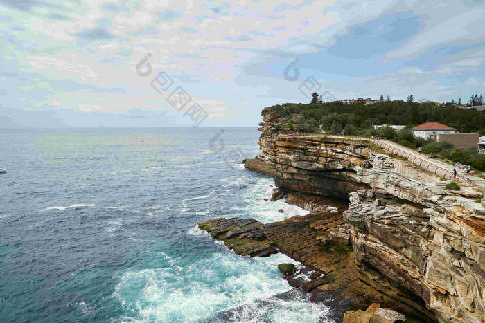 沿海礁石海浪岩石风景摄影图