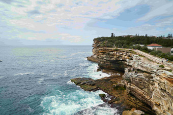 沿海礁石海浪岩石风景摄影图