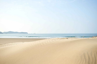 沿海沙子海滩旅游风景摄影图