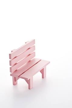 椅子板凳上粉红色的颜色