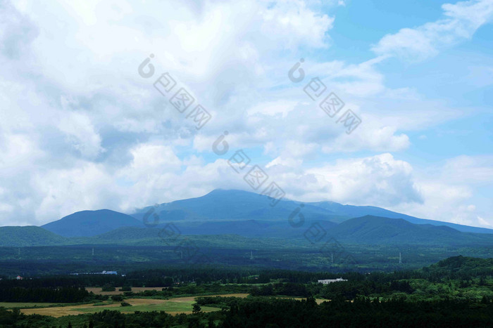 济州岛火山蓝天风景摄影图