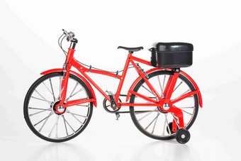 红色自行车模型静物摄影图