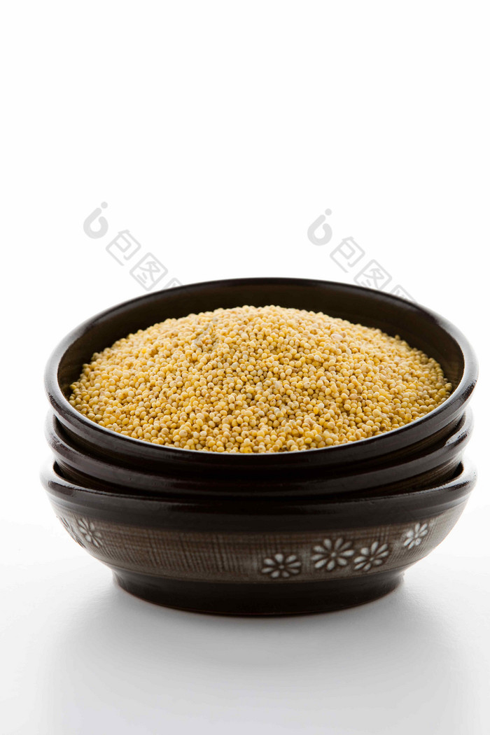 粮食碗黄色小米食物细节摄影图
