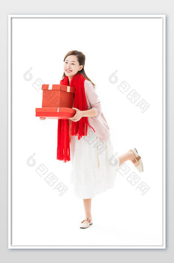 春节新年年轻女性送礼物拜年图片