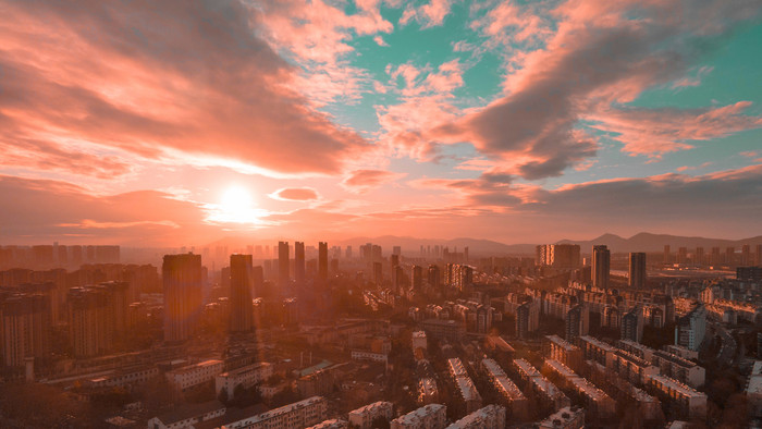 4k航拍城市夕阳落日余晖延时摄影青橙色调