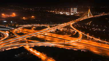 4K航拍城市立交车流夜景延时摄影橙黑色调