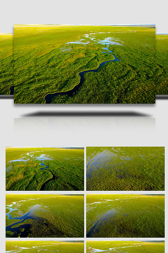 夕阳西下辽阔草原上蜿蜒的溪流4k航拍视频图片