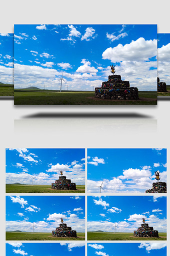 白云飘移下的草原大风车及敖包4k延时拍摄图片