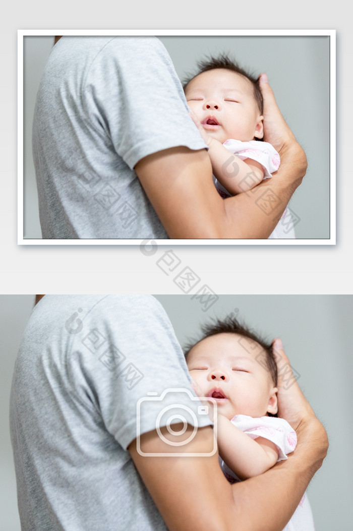 父亲抱着熟睡的宝宝图片图片