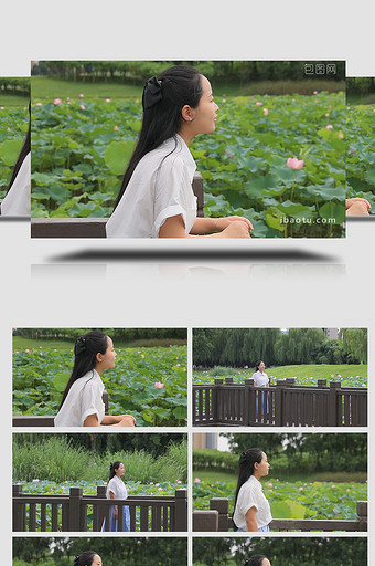 人物形象女孩在公园欣赏荷花4K实拍图片