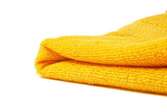黄色折叠整齐的毛巾